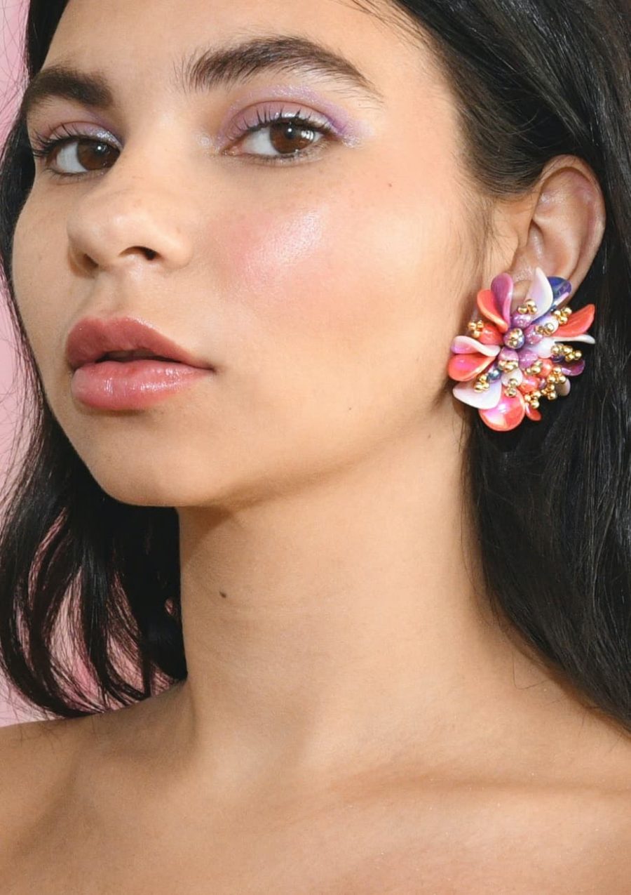Flower stud earrings on model by live-to-express.