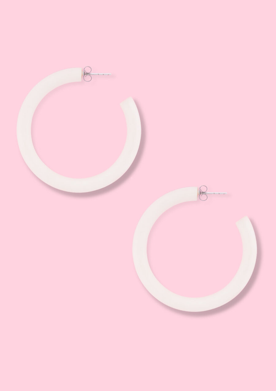 White hoop earrings, by live-to-express. Shop online for vintage hoops.