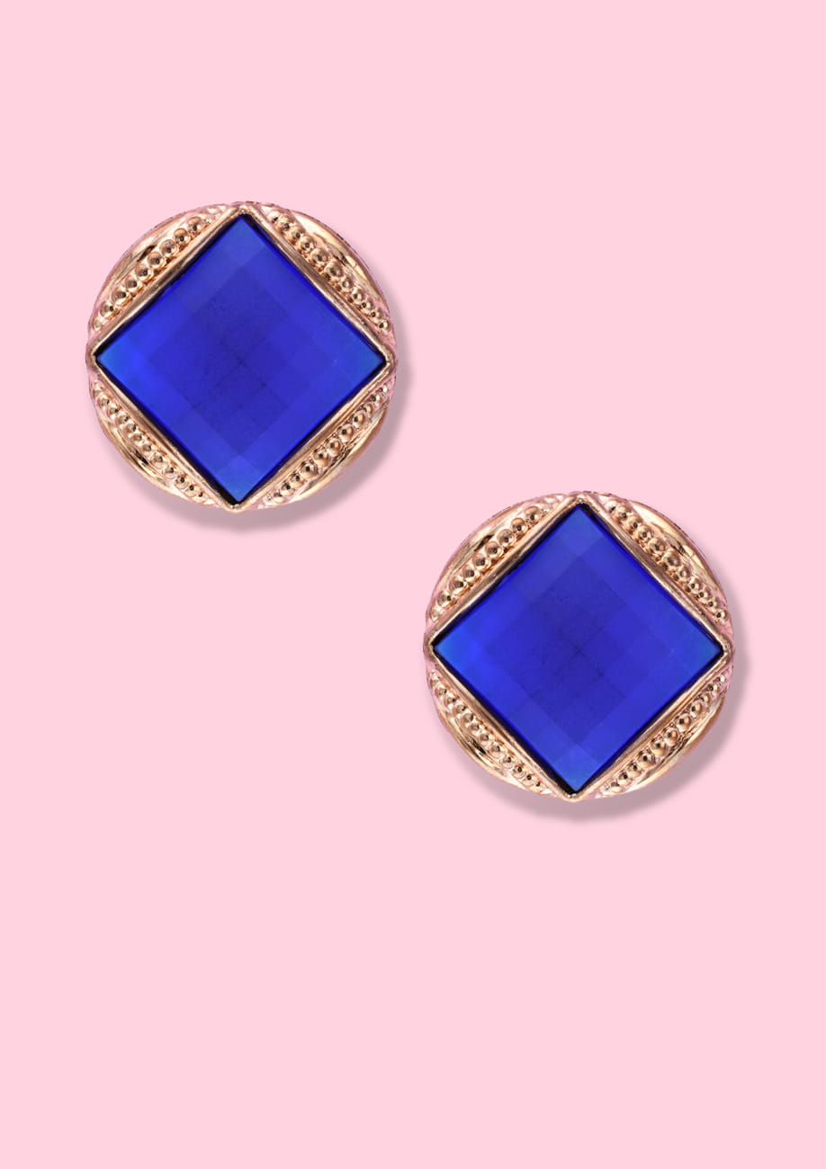 Blue and gold vintage clip-on stud earrings, by live-to-express. Online 80's vintage earrings shop.