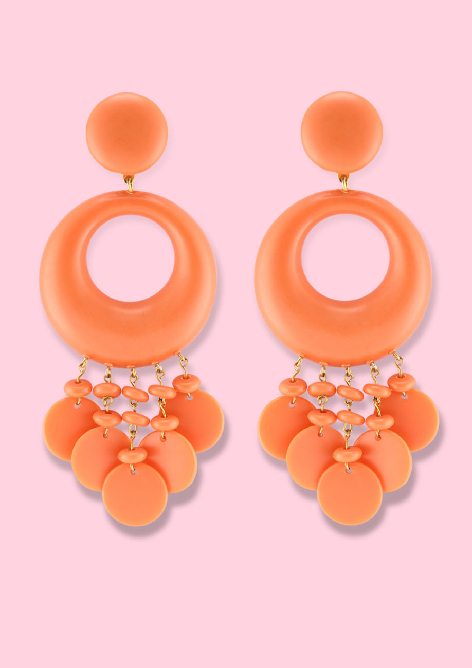 Orange statement earrings by live to express. Sustainable earrings online at live-to-express.