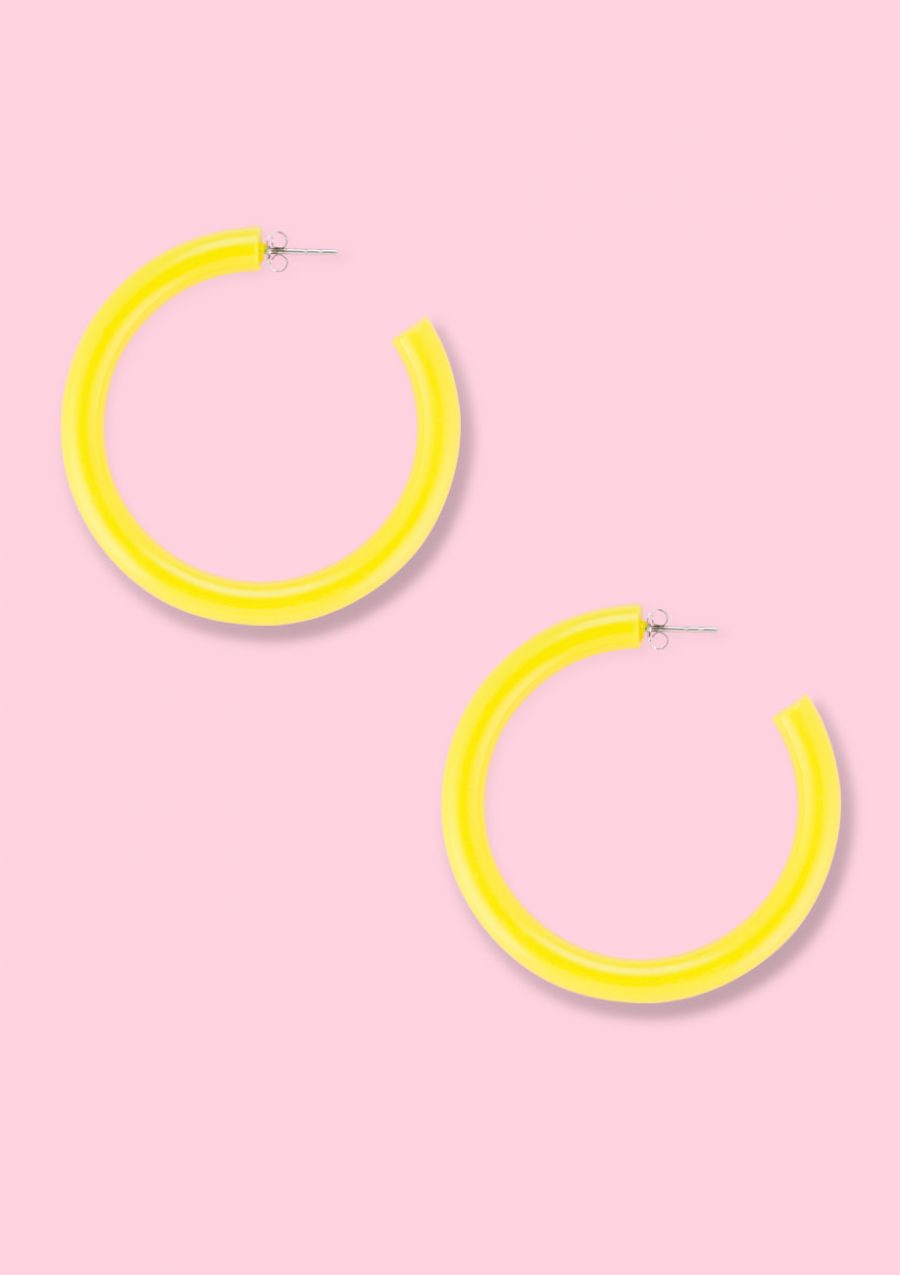 Yellow neon hoop earrings, by live-to-express. Shop online vintage hoops.