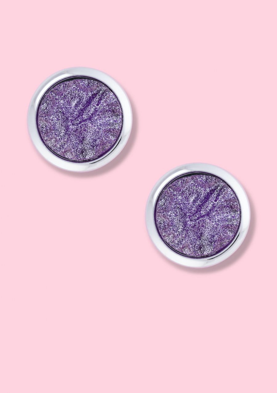 Purple glitter stud earrings with clip-on closing, by live-to-express. Shop 80’s vintage design earrings online.