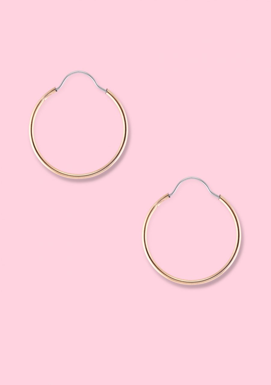 Small golden hoop earrings by live-to-express. Shop sustainable vintage online at live-to-express.
