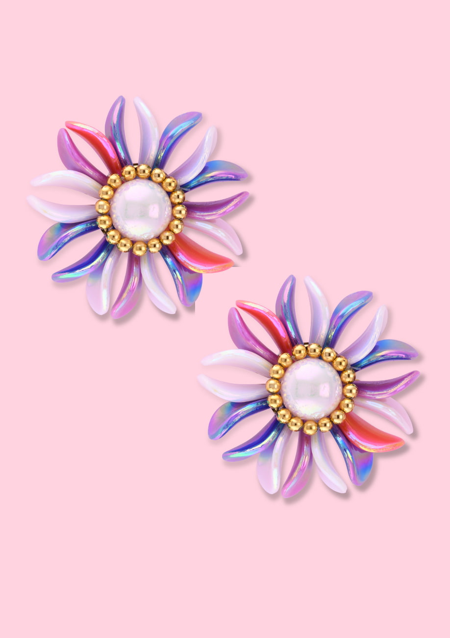 White pearl flower clip-on stud earring, by live-to-express. Shop 80's vintage earrings online.