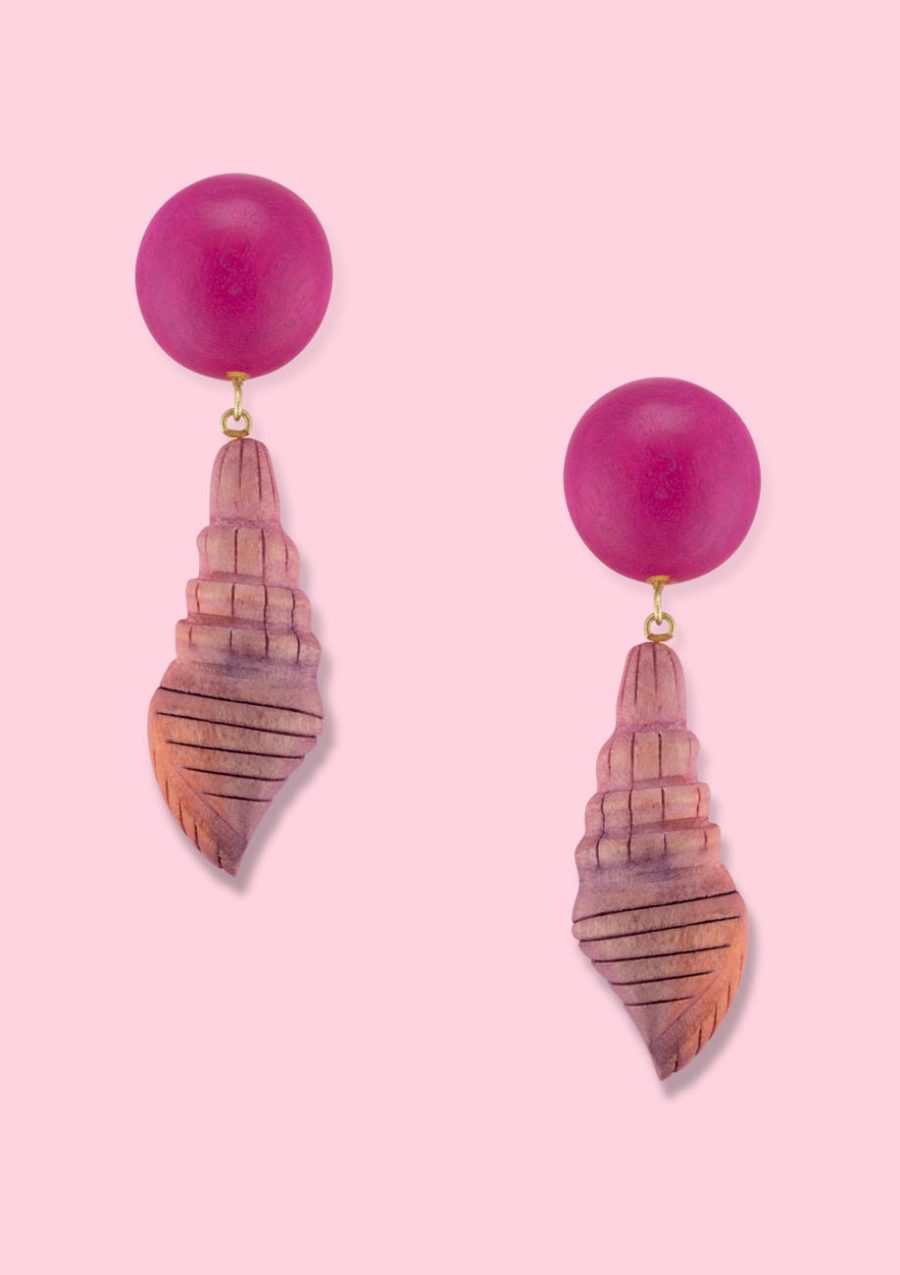 Red wooden clip-on drop earrings by live-to-express. Shop sustainable vintage earrings online.