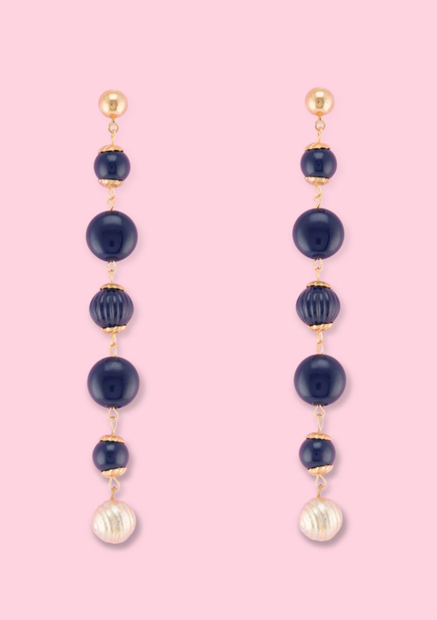 Blue vintage dangle earrings by live-to-express. Shop vintage push-back earrings online.
