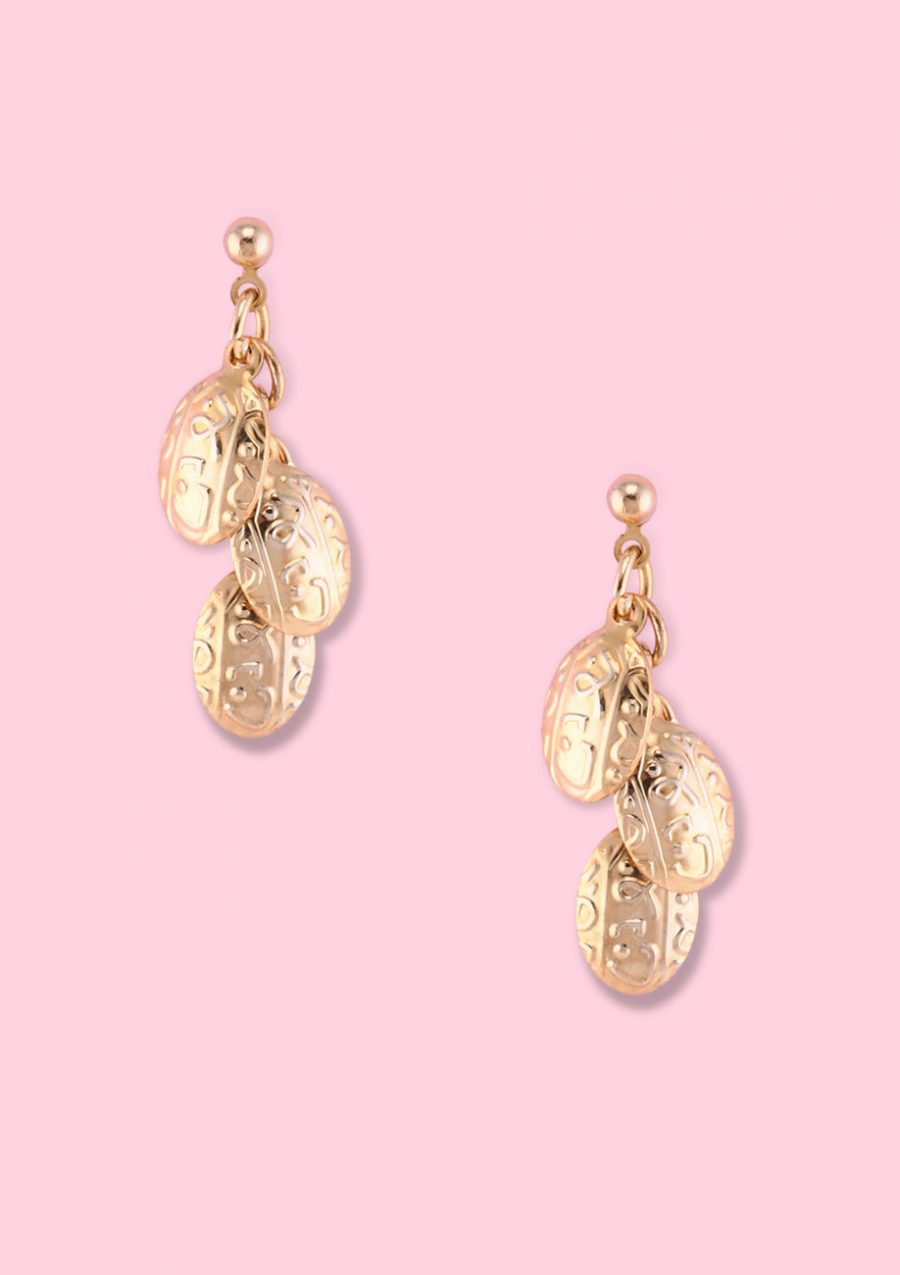 Gold embossed fine earrings by live-to-express. Shop 90’s vintage ear jewellery online.