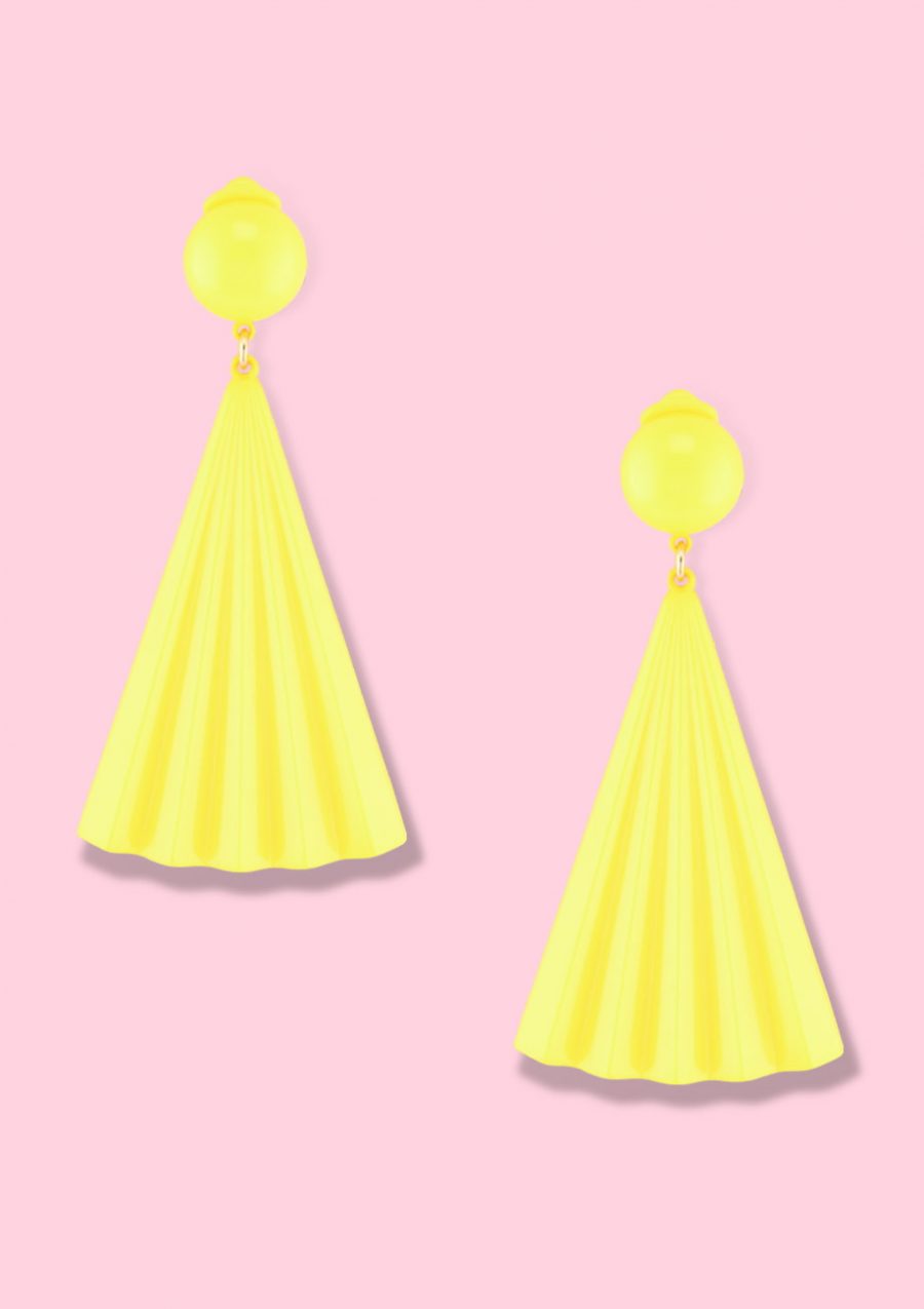 Yellow drop earrings by live-to-express. Shop 70's vintage clip-on earrings online.