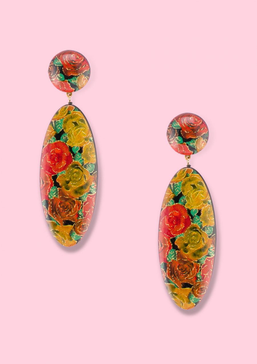 Orange floral glitter drop earrings by live-to-express. Shop vintage clip-on earrings online.